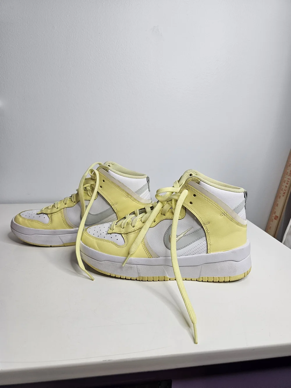 Nike Yellow & White Mid-Top Sneakers with Silver Swoosh